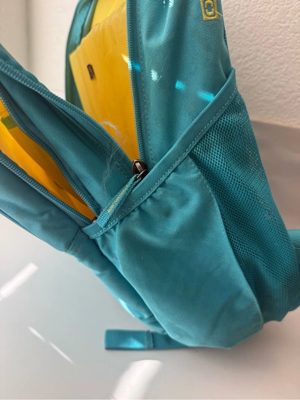 OGIO Aqua Blue Backpack with Yellow Logo